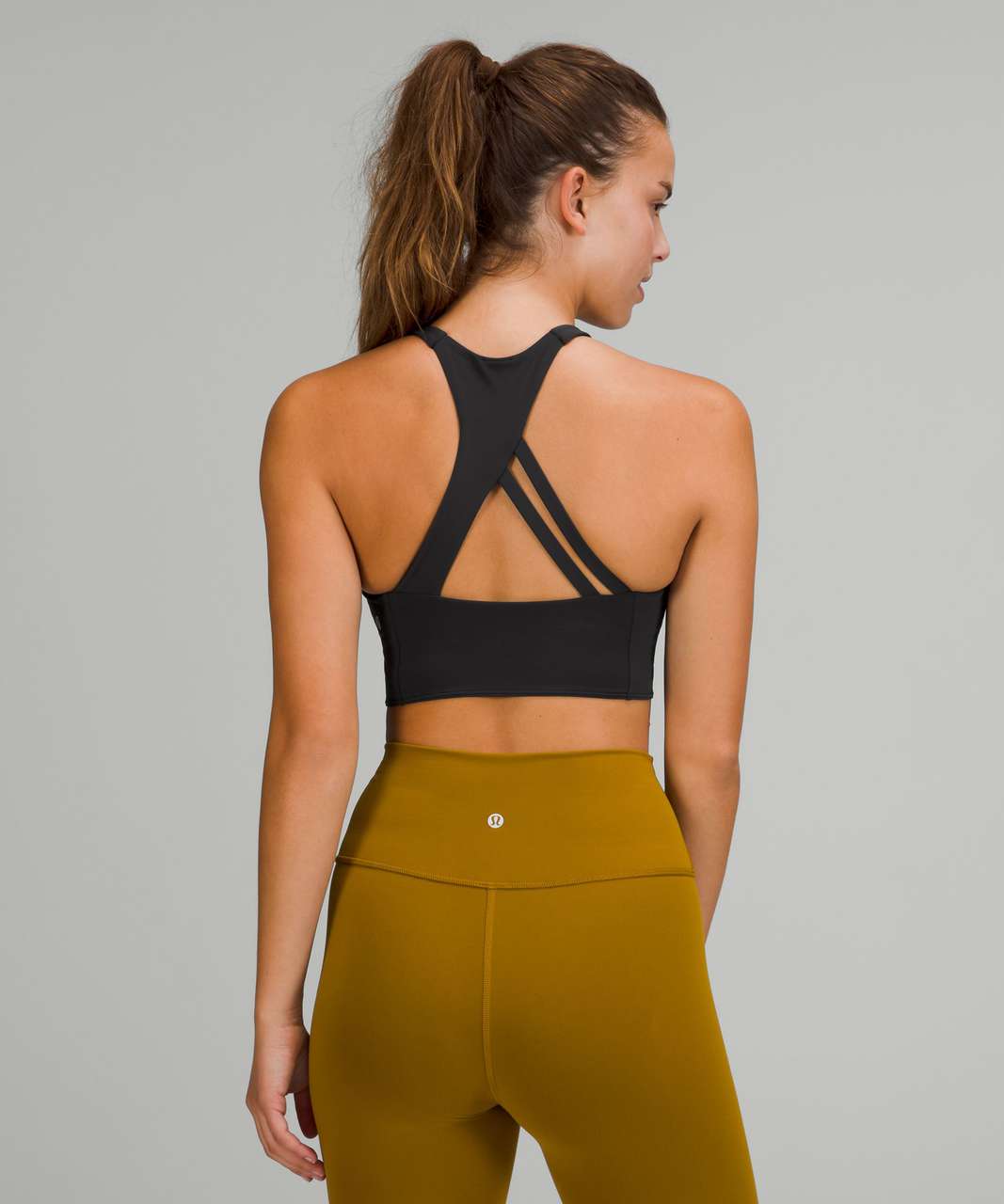 https://storage.googleapis.com/lulu-fanatics/product/69283/1280/lululemon-strong-lines-bra-medium-support-b-c-cup-black-0001-374971.jpg