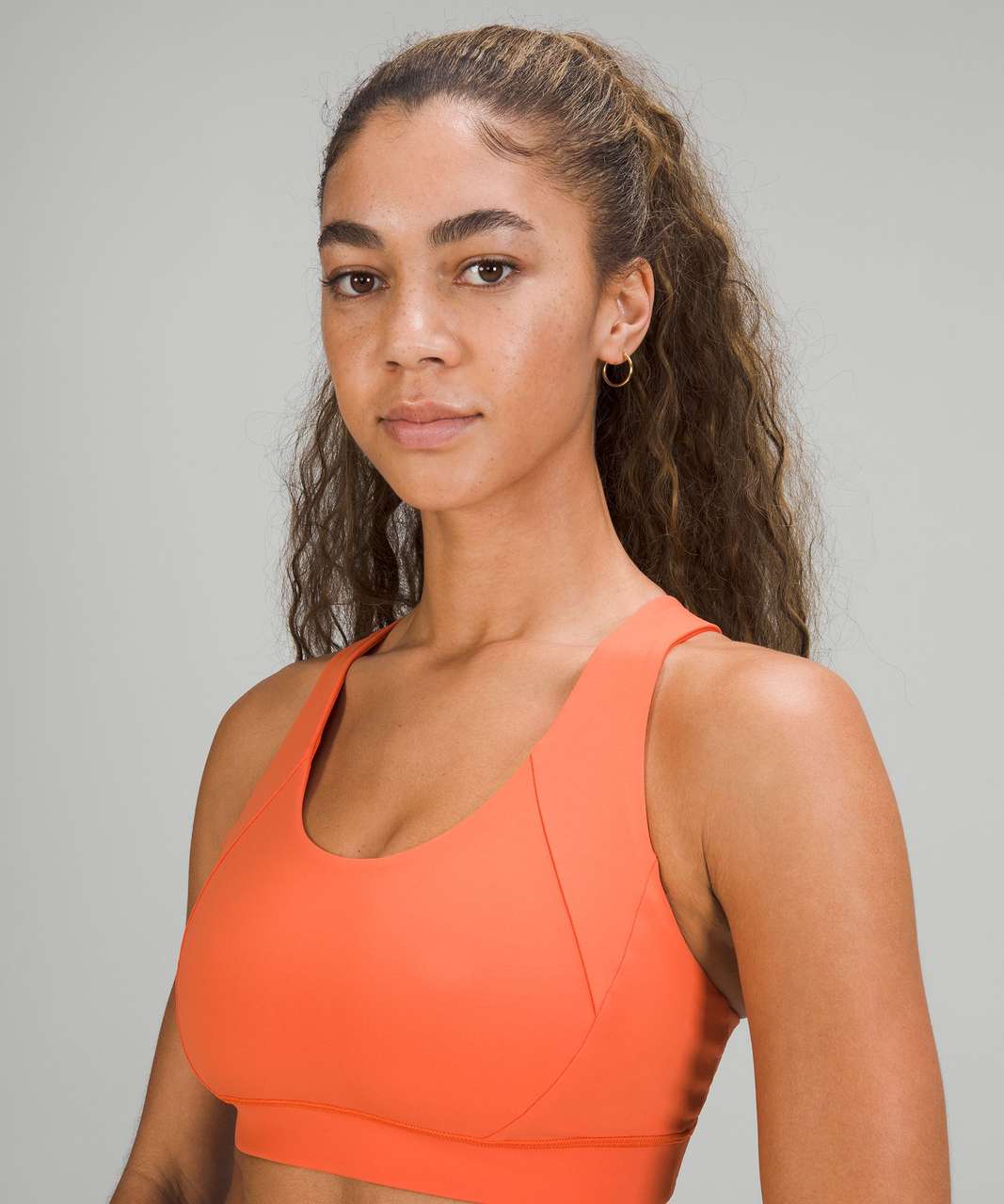 https://storage.googleapis.com/lulu-fanatics/product/70220/1280/lululemon-free-to-be-elevated-bra-light-support-dd-ddd-e-cup-warm-coral-048227-379355.jpg