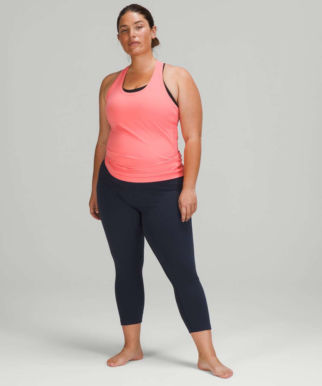 I felt amazing and sculpted in my new raspberry cream align tank top, but  then a coworker stated I needed to fix my top. Should I size up? :  r/lululemon