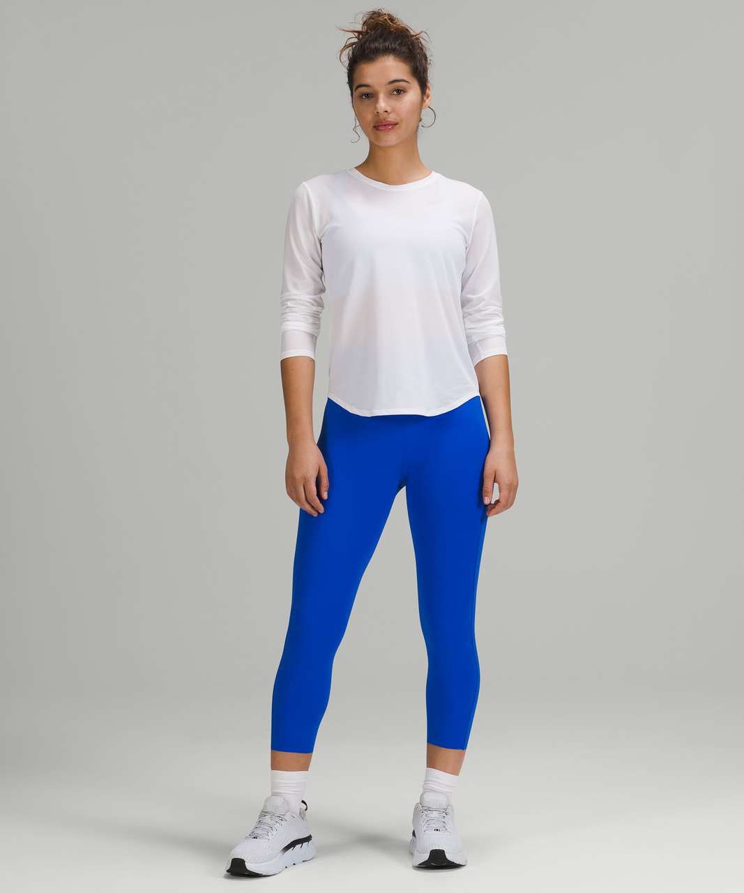 https://storage.googleapis.com/lulu-fanatics/product/72199/1280/lululemon-base-pace-high-rise-crop-23-blazer-blue-tone-033158-386938.jpg