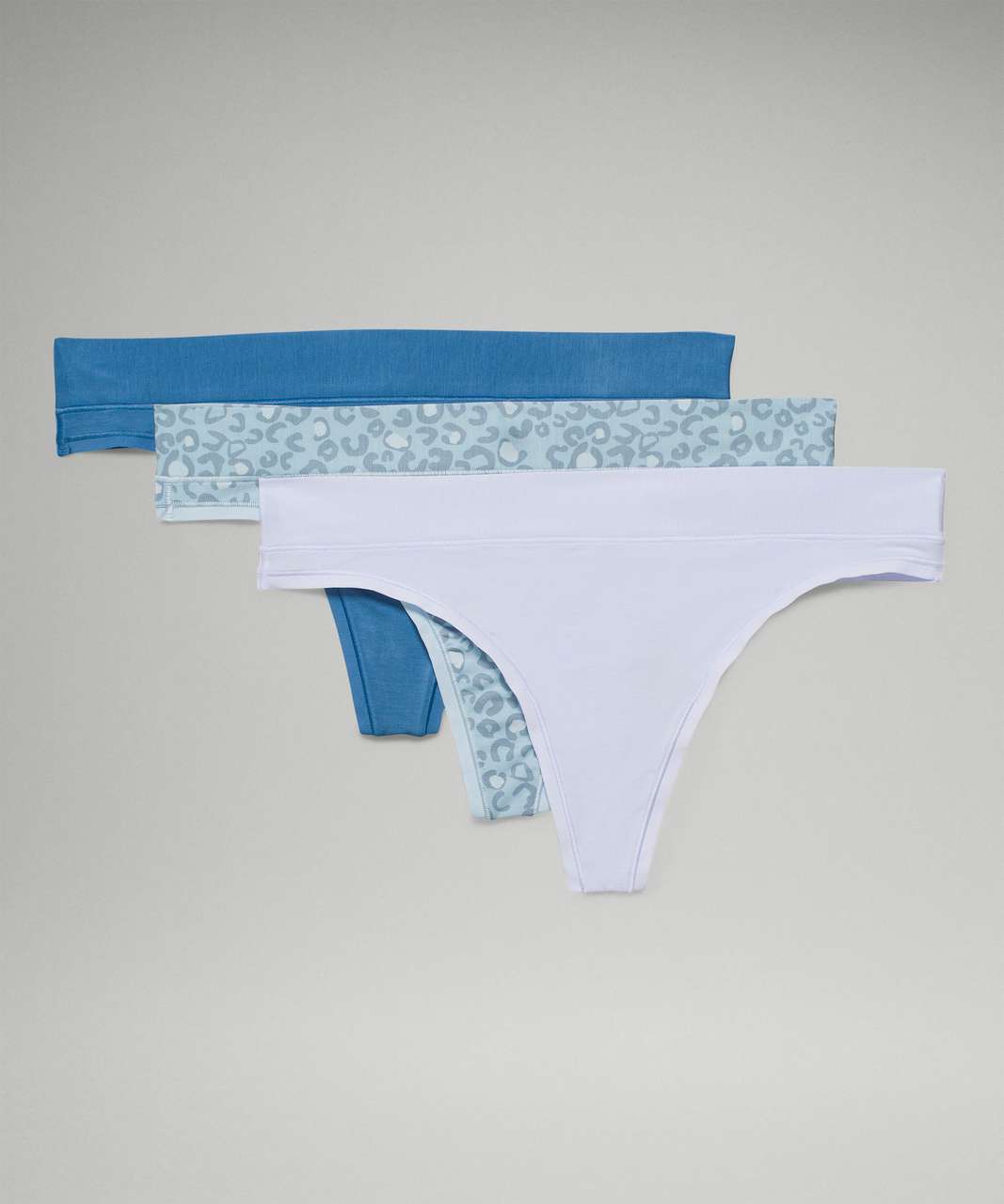 Lululemon UnderEase Mid-Rise Thong Underwear 3 Pack - Pastel Blue / Soft  Denim / Intertwined Print Cirrus Blue Multi - lulu fanatics