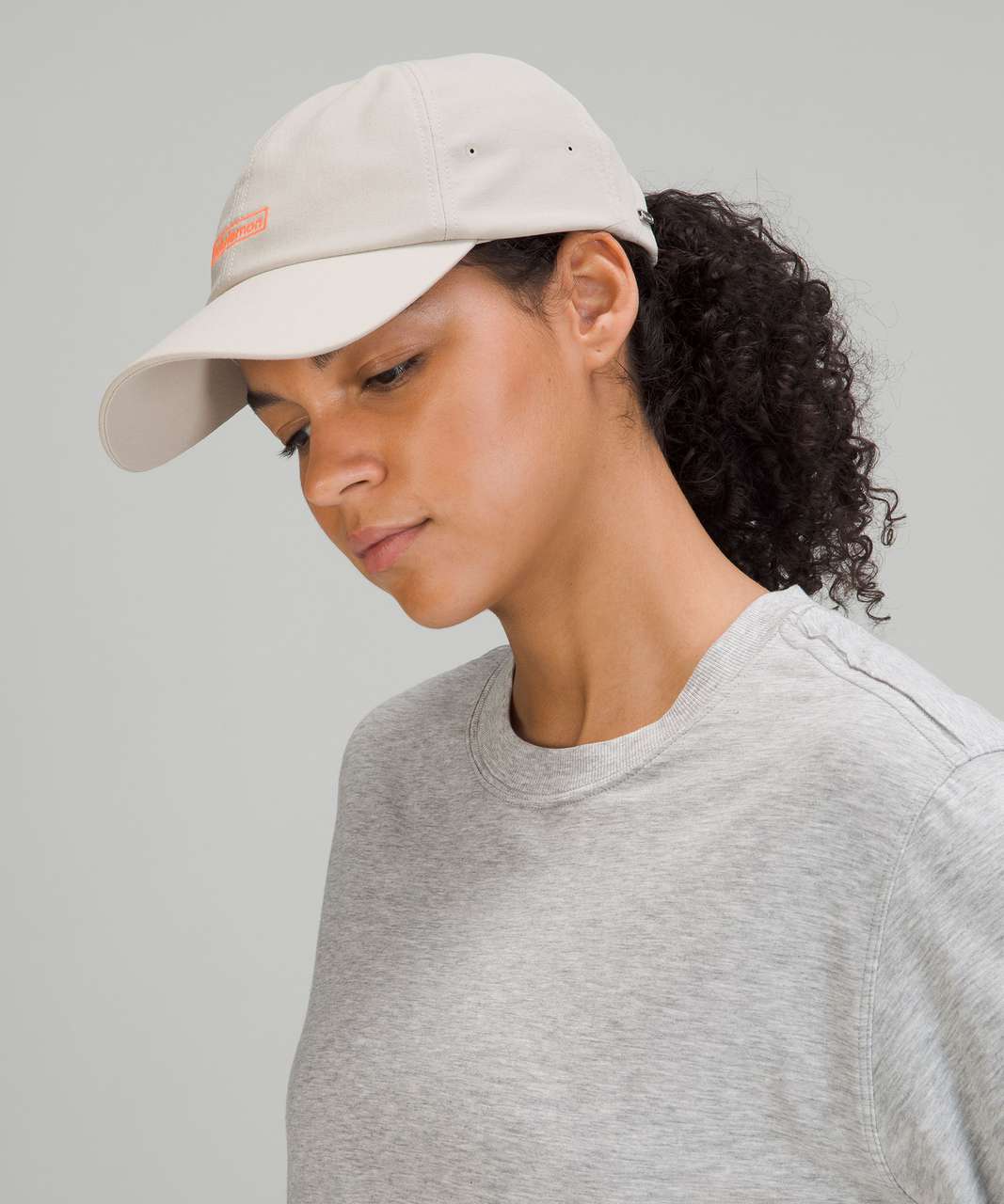 https://storage.googleapis.com/lulu-fanatics/product/72489/1280/lululemon-baller-hat-soft-raw-linen-048432-388234.jpg