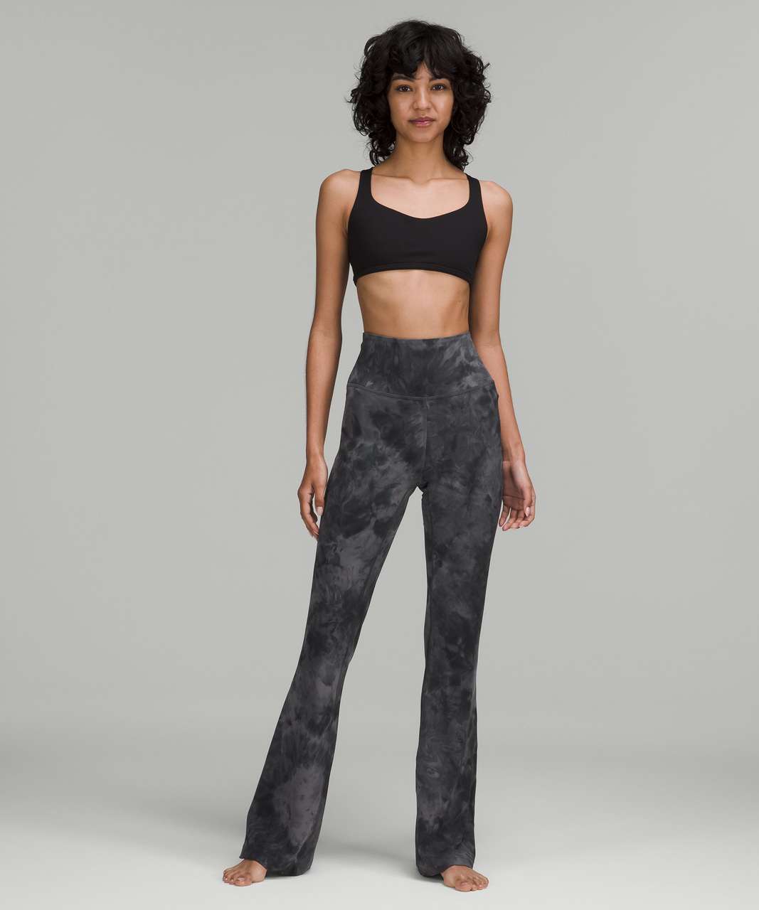 https://storage.googleapis.com/lulu-fanatics/product/72538/1280/lululemon-groove-super-high-rise-flared-pant-nulu-diamond-dye-pitch-grey-graphite-grey-043990-388493.jpg