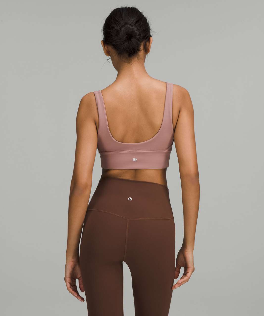 https://storage.googleapis.com/lulu-fanatics/product/73034/1280/lululemon-lululemon-align-reversible-bra-light-support-a-b-cup-twilight-rose-twilight-rose-055759-390886.jpg