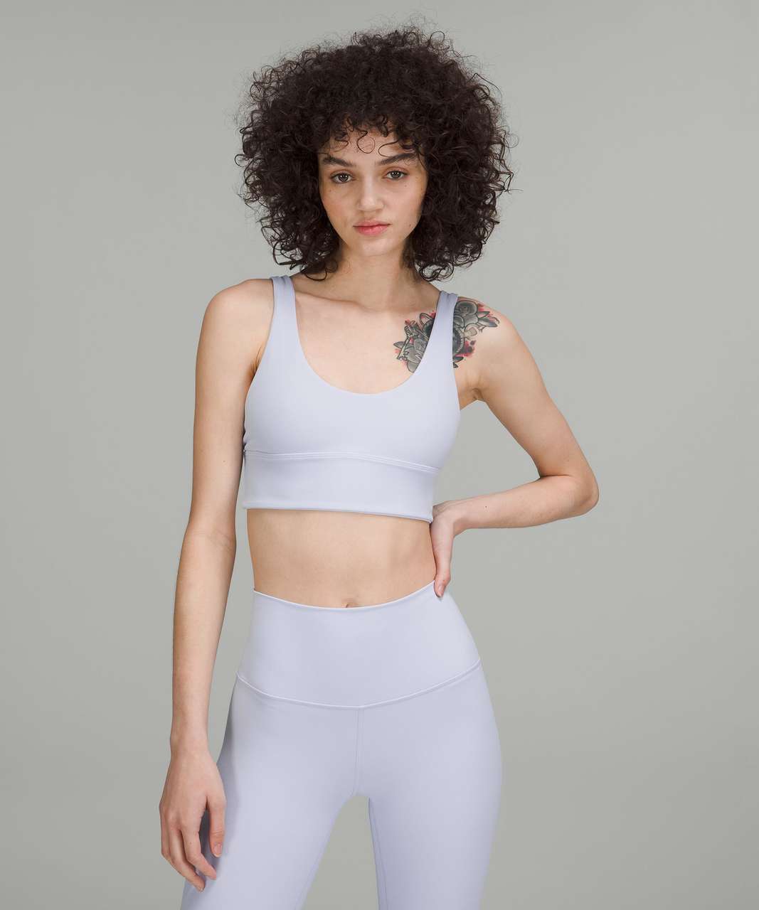 https://storage.googleapis.com/lulu-fanatics/product/73040/1280/lululemon-lululemon-align-reversible-bra-light-support-a-b-cup-pastel-blue-heathered-pastel-blue-055495-390913.jpg