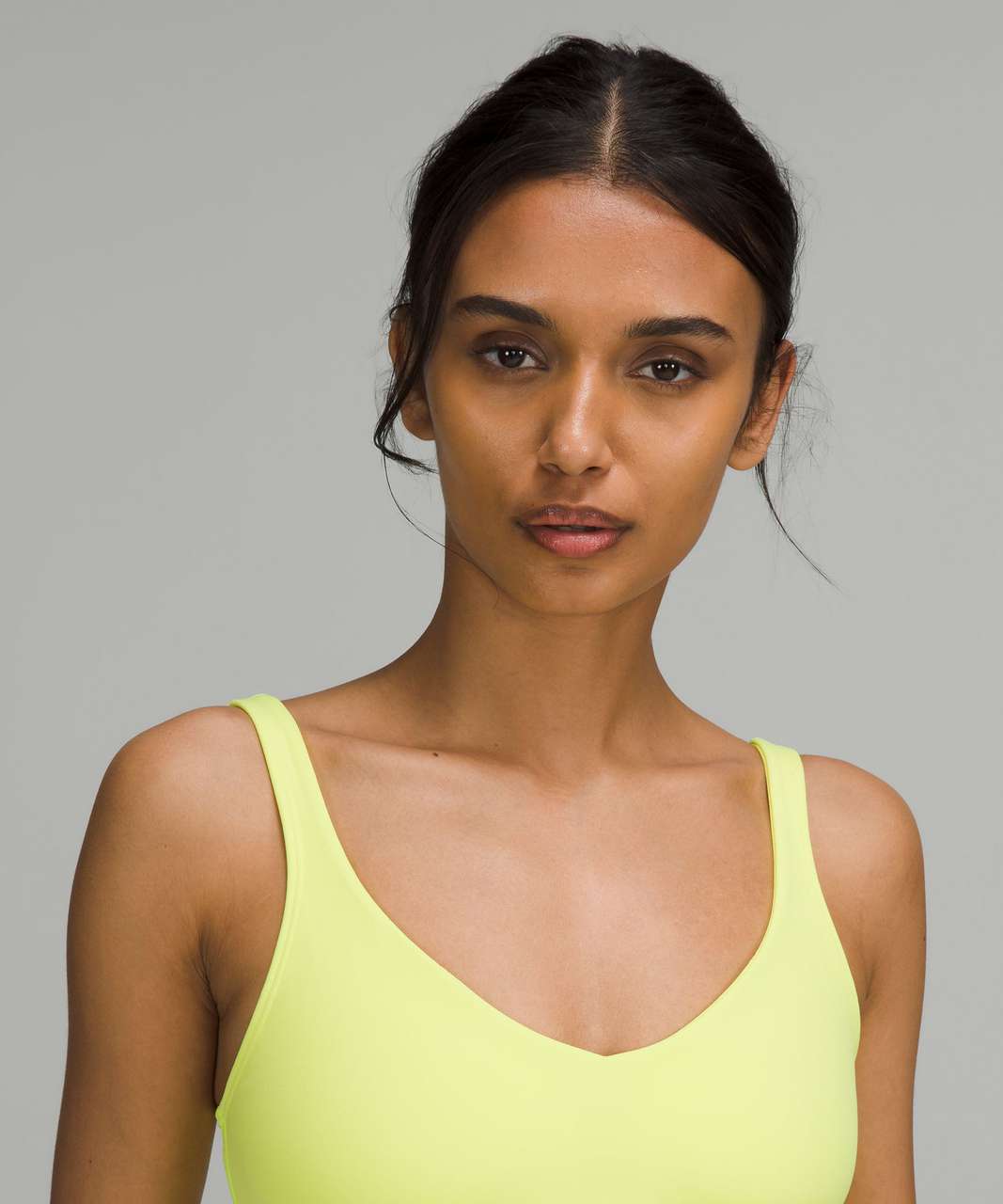 Electric Lemon Align Tank vs Free People Happiness Runs tank glow