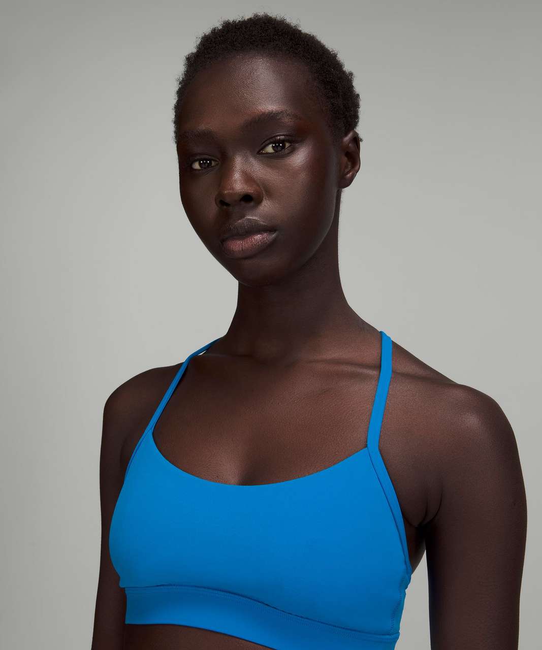 https://storage.googleapis.com/lulu-fanatics/product/73718/1280/lululemon-flow-y-nulu-bra-light-support-a-c-cups-poolside-054319-394018.jpg