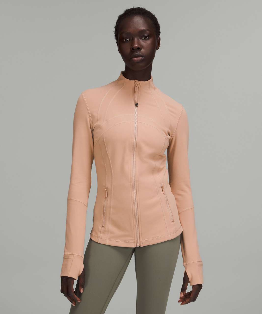 https://storage.googleapis.com/lulu-fanatics/product/73828/1280/lululemon-define-jacket-luon-pink-clay-040036-394516.jpg