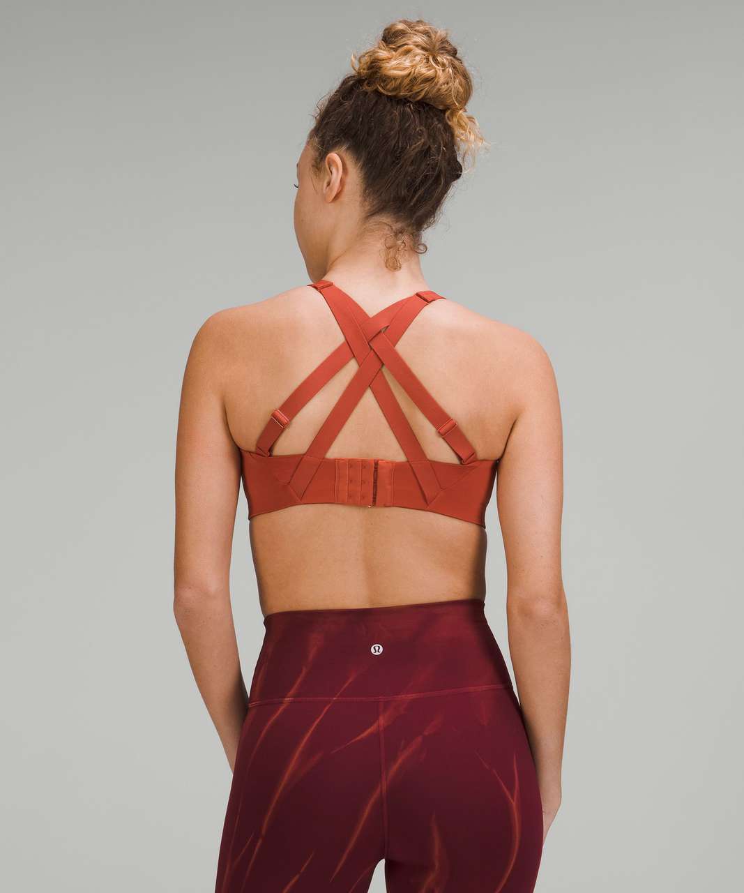 https://storage.googleapis.com/lulu-fanatics/product/73912/1280/lululemon-energy-bra-high-support-b-ddd-cups-red-rock-052776-394943.jpg