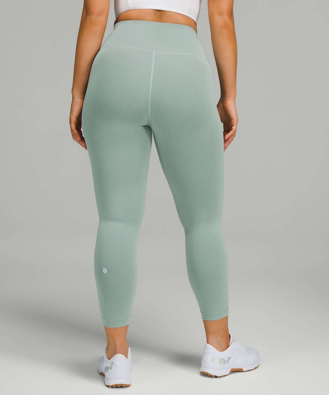 https://storage.googleapis.com/lulu-fanatics/product/74147/1280/lululemon-wunder-train-contour-fit-high-rise-crop-23-misty-glade-053503-396096.jpg