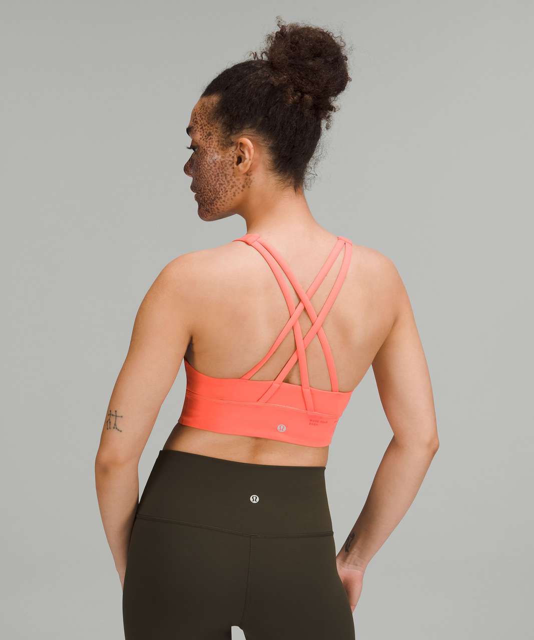 https://storage.googleapis.com/lulu-fanatics/product/74250/1280/lululemon-energy-high-neck-longline-bra-medium-support-b-d-cups-raspberry-cream-052827-396636.jpg