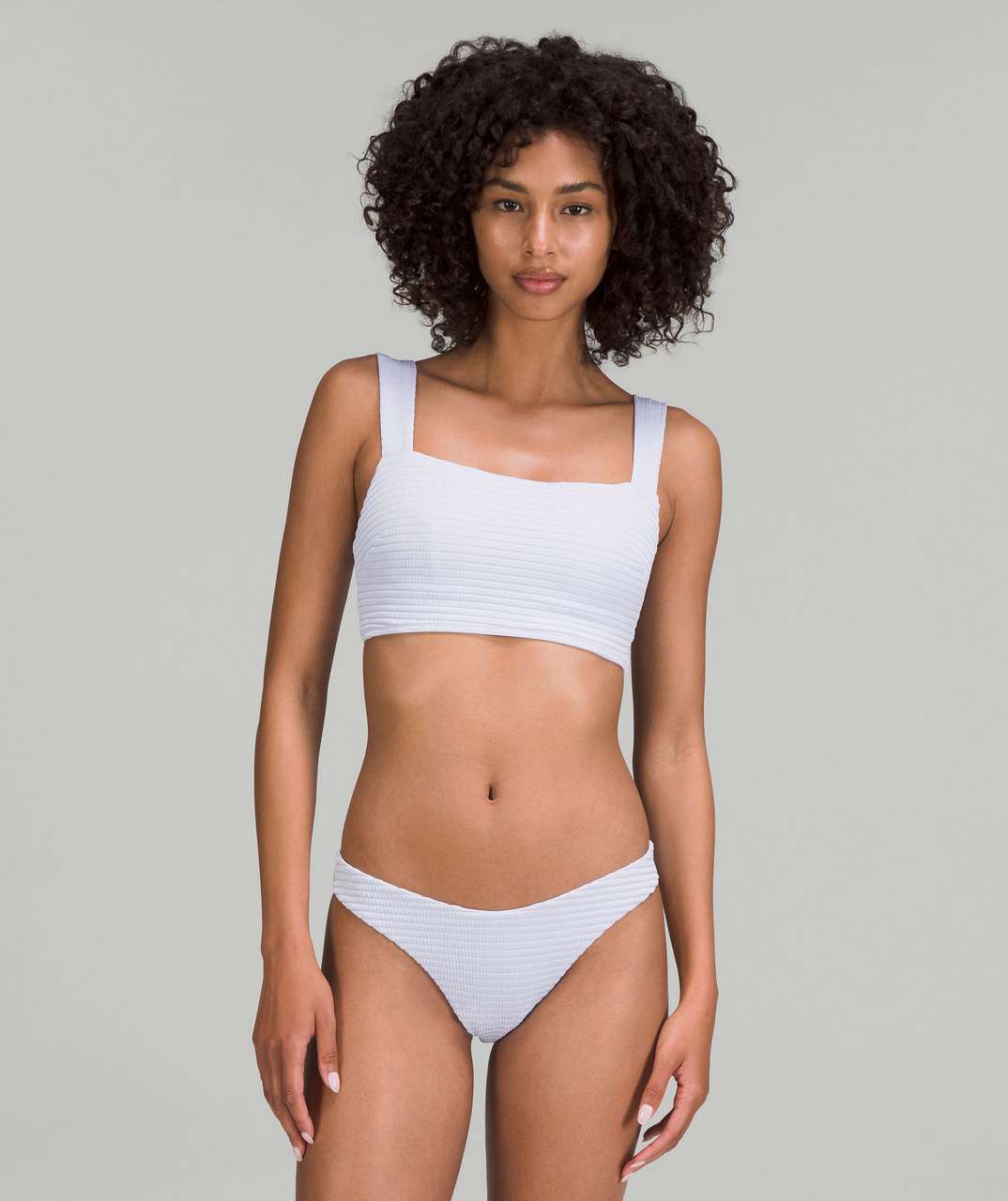 https://storage.googleapis.com/lulu-fanatics/product/74303/1280/lululemon-smocked-swim-top-b-c-cup-hyper-stripe-pastel-blue-056119-396873.jpg