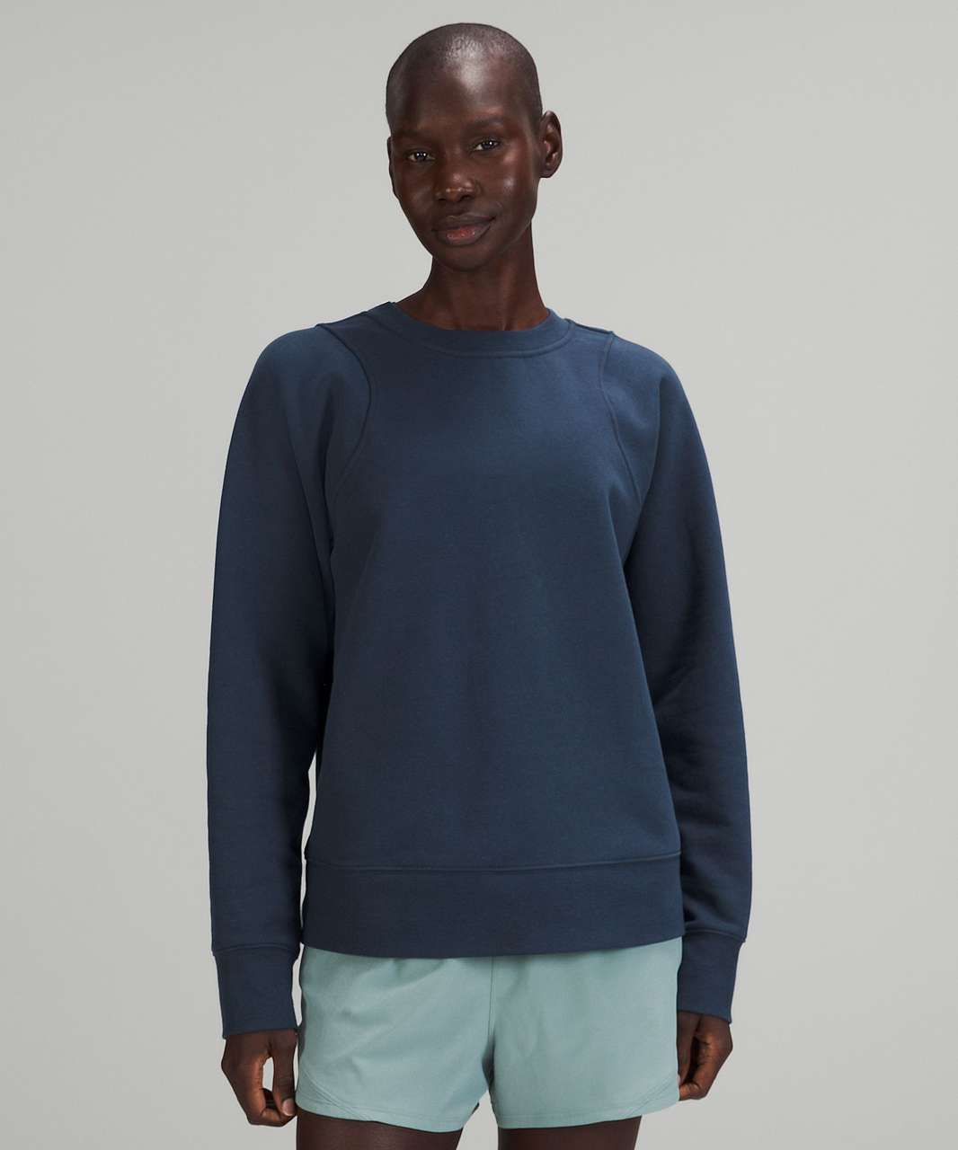 https://storage.googleapis.com/lulu-fanatics/product/74407/1280/lululemon-loungeful-crewneck-pullover-mineral-blue-030384-397278.jpg