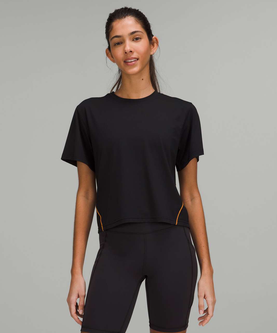 Lululemon Ventilated Open-Back Training T-Shirt - Black / Orange Soda