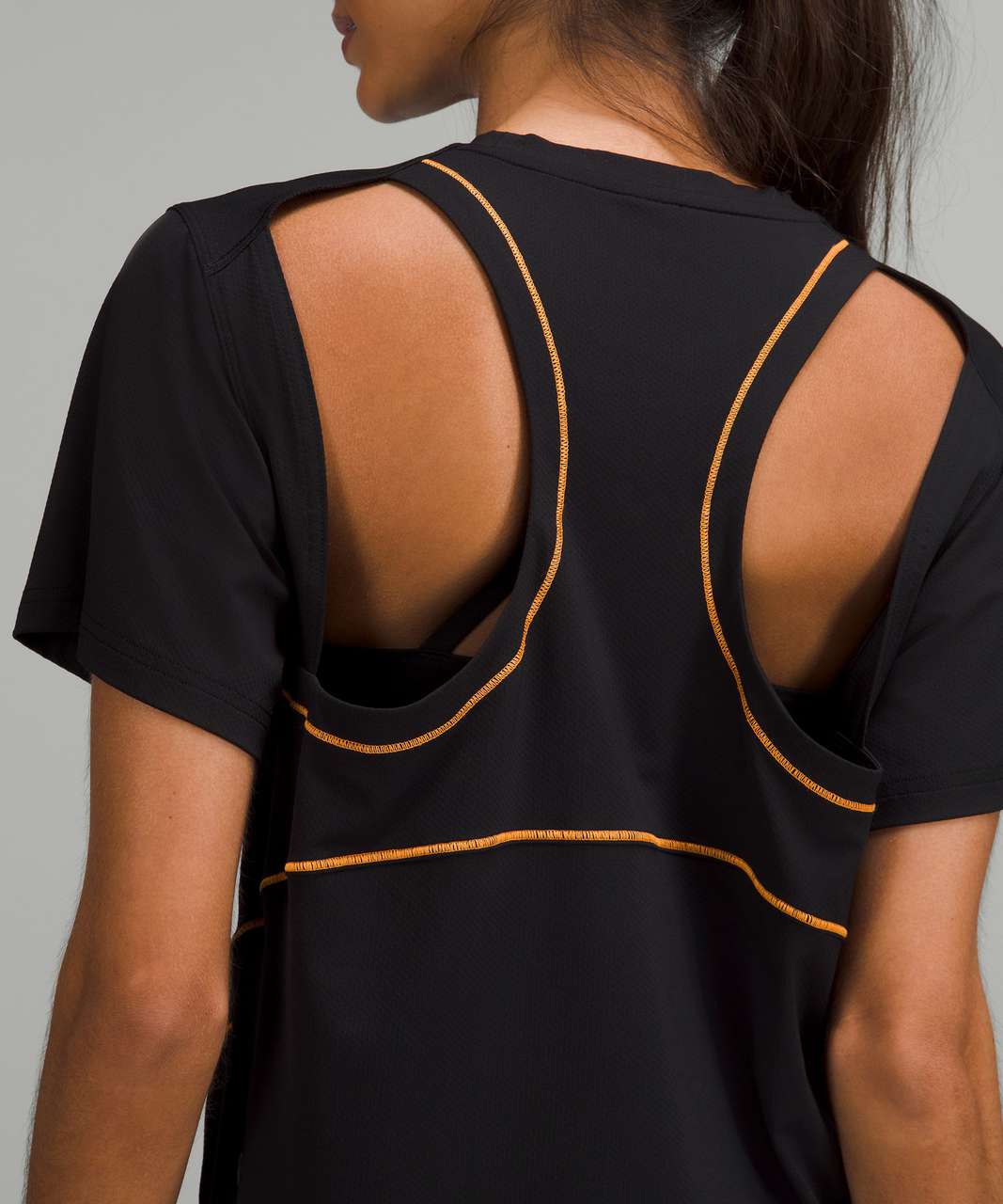 Lululemon Ventilated Open-Back Training T-Shirt - Black / Orange Soda