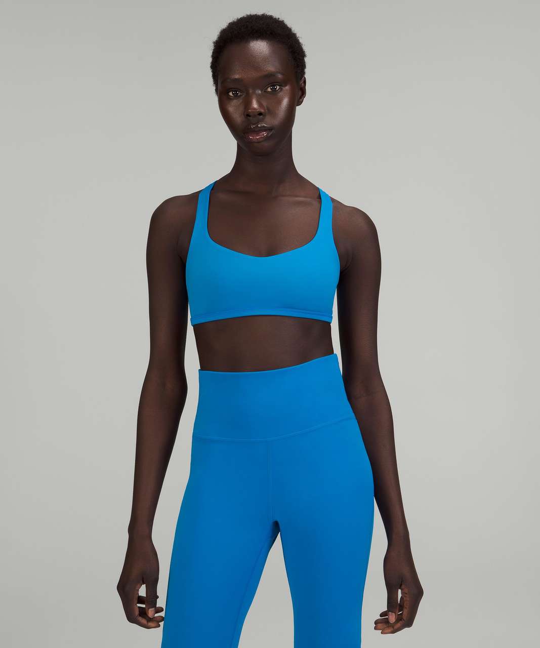 Free People FREE THROW CROP - Light support sports bra - washed aqua/light  blue - Zalando.de