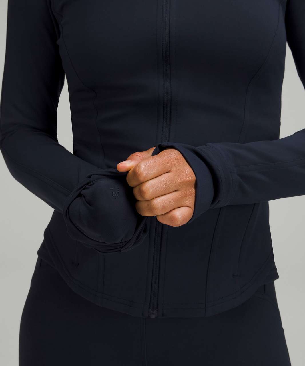 https://storage.googleapis.com/lulu-fanatics/product/75284/1280/lululemon-instill-jacket-true-navy-031382-401501.jpg