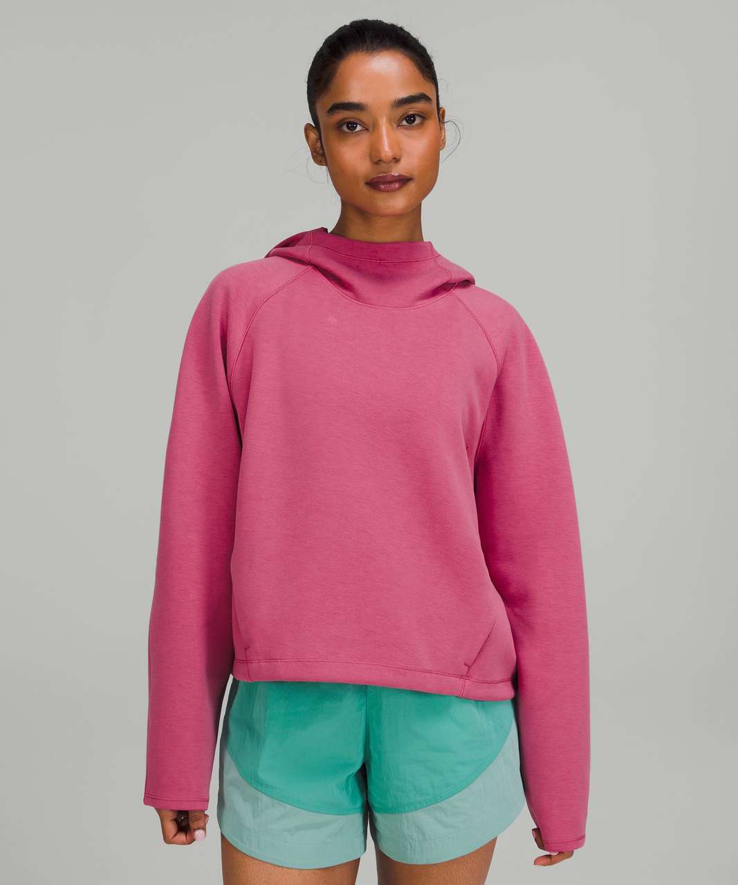 https://storage.googleapis.com/lulu-fanatics/product/75548/1280/lululemon-airwrap-modal-pullover-hoodie-pink-lychee-049472-402770.jpg