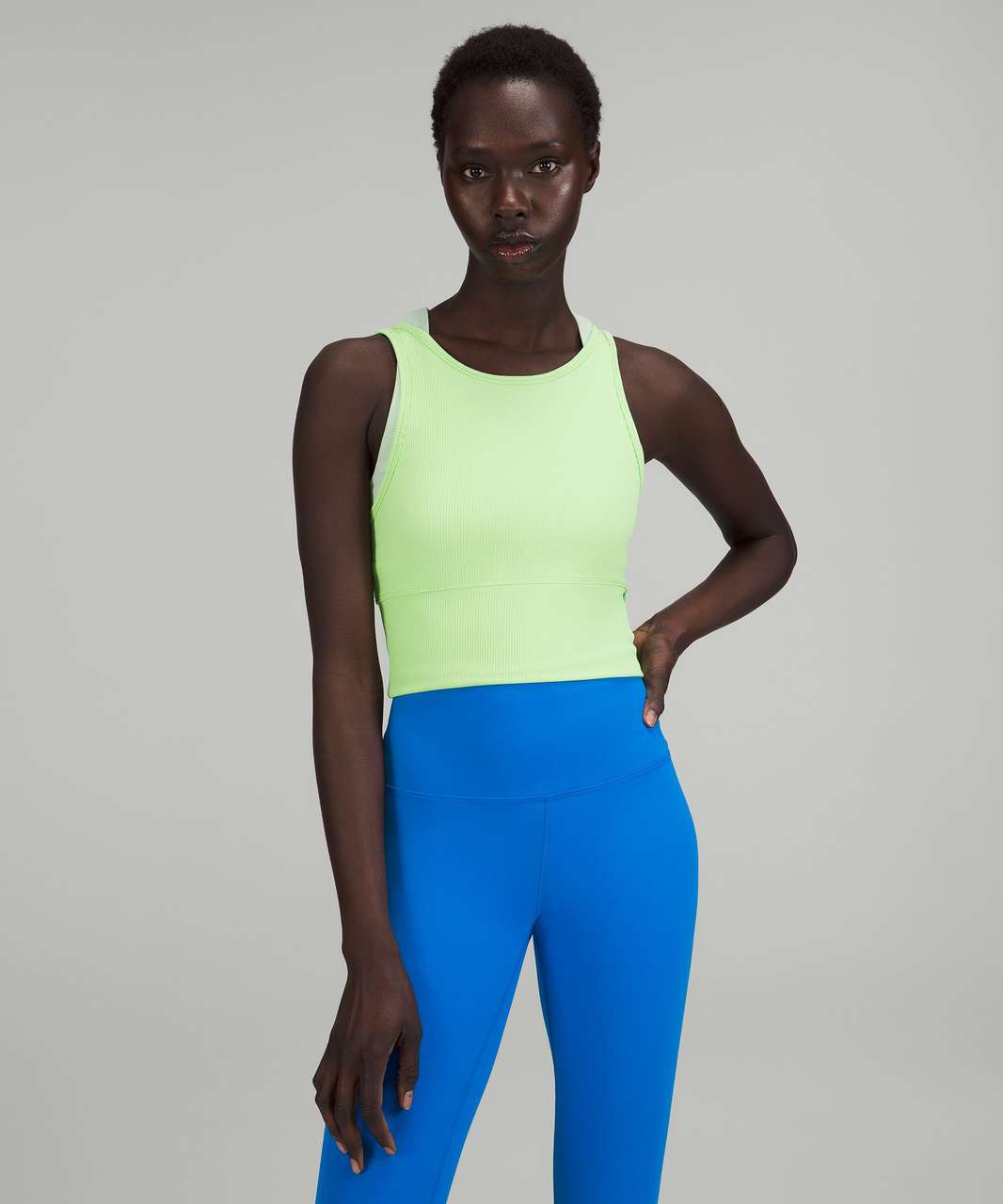 https://storage.googleapis.com/lulu-fanatics/product/75688/1280/lululemon-power-pivot-ribbed-tank-top-scream-green-light-054247-403460.jpg