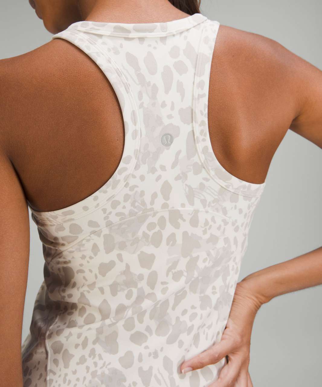 Cheetah Camo Antique White Multi align tank high neck and my waterdrop  aligns. Not sure how I feel about the print… is it too much? : r/lululemon