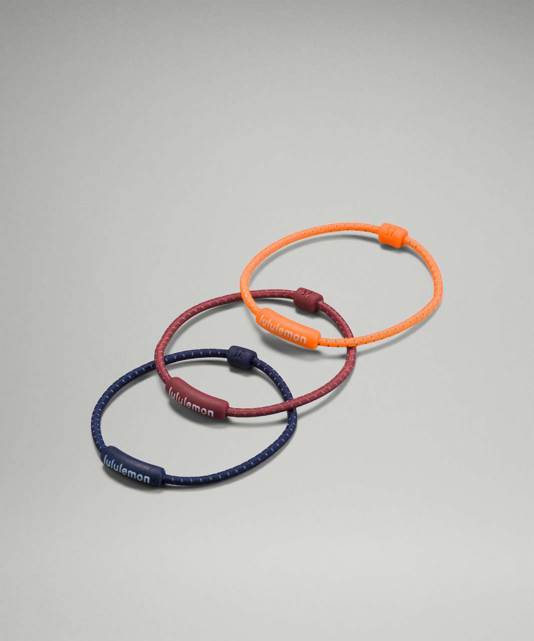 Lululemon Silicone Hair Ties 3 Pack - Night Sea / Smoky Red / Highlight Orange