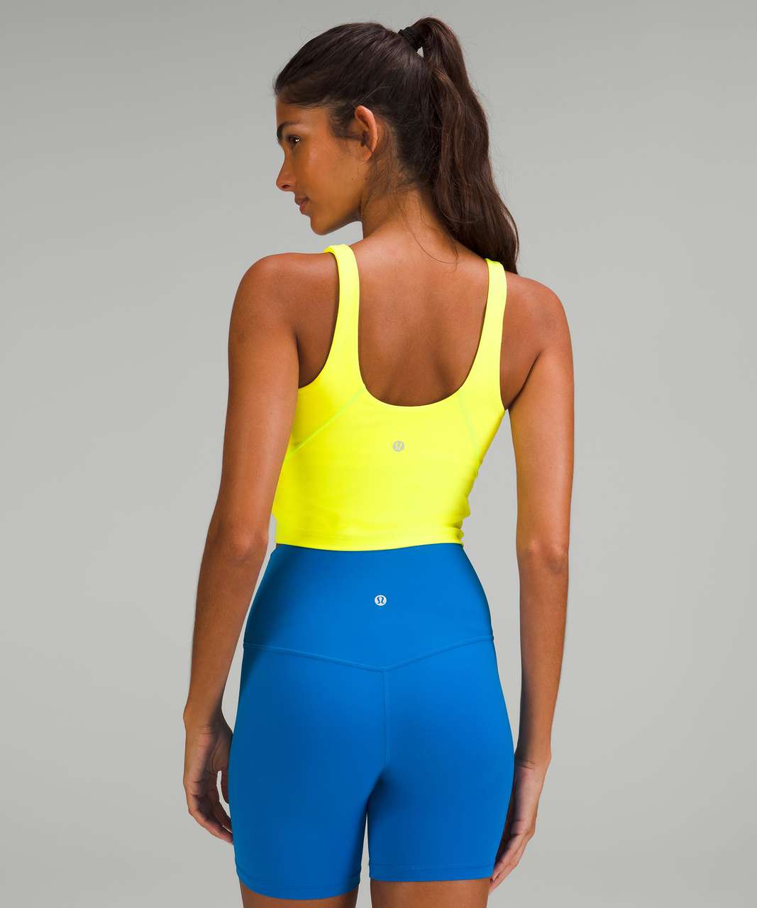 Electric Lemon Align Tank vs Free People Happiness Runs tank glow stick. If  you are looking for colour dupe.. : r/lululemon