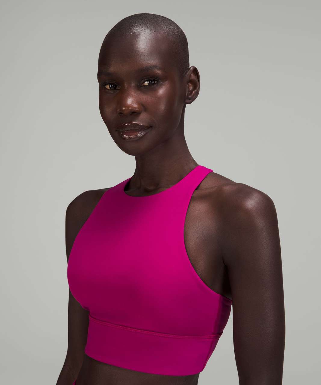 https://storage.googleapis.com/lulu-fanatics/product/76773/1280/lululemon-energy-high-neck-longline-tough-bra-medium-support-b-d-cups-magenta-purple-054428-409071.jpg