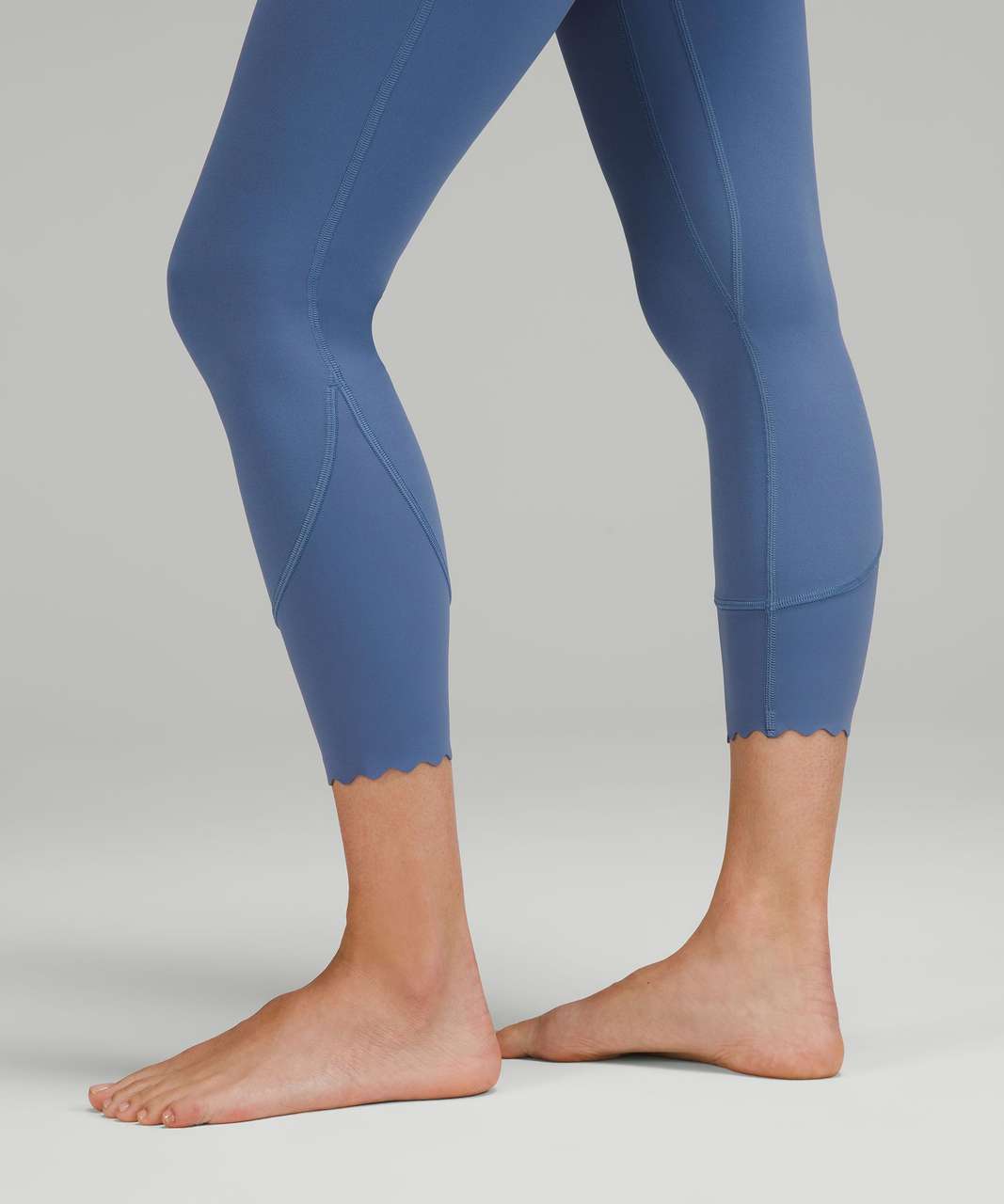 https://storage.googleapis.com/lulu-fanatics/product/77109/1280/lululemon-lululemon-align-scalloped-hem-high-rise-crop-23-water-drop-047824-410670.jpg