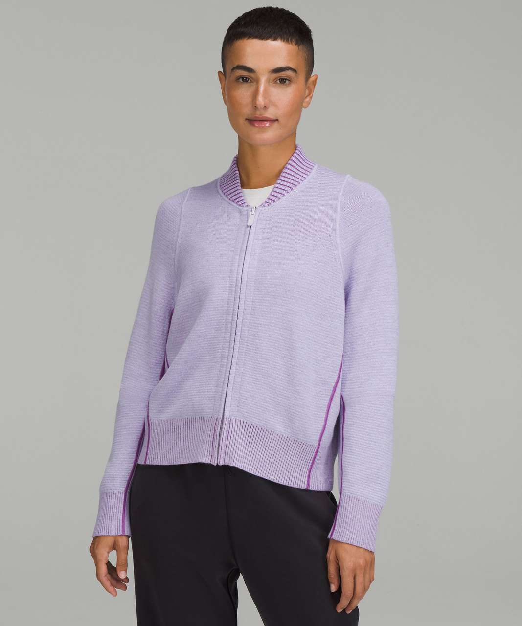 https://storage.googleapis.com/lulu-fanatics/product/77139/1280/lululemon-reversible-double-knit-zip-up-sweater-faint-lavender-moonlit-magenta-059147-410846.jpg