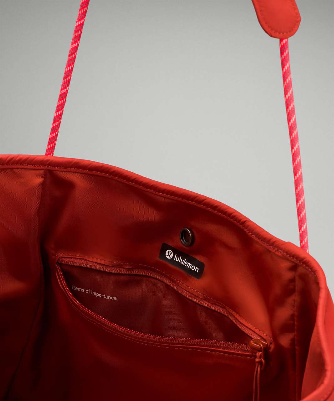 Lululemon reusable small red holiday shopping tote bag