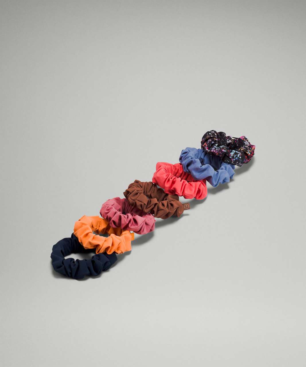 Lululemon Uplifting Scrunchie 7 Pack - True Navy / Orange Frappe / Brier Rose / Roasted Brown / Pale Raspberry / Water Drop / Floral Spray Multi