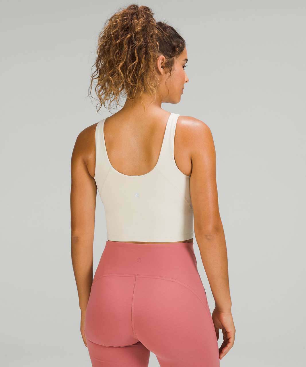 Align High-Neck Tank (Canyon Orange) vs Align Tank (Pink Puff