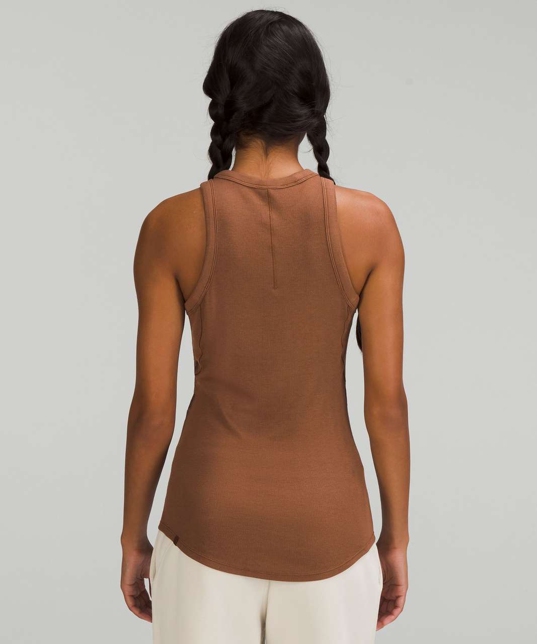 https://storage.googleapis.com/lulu-fanatics/product/78567/1280/lululemon-hold-tight-tank-top-roasted-brown-055842-417777.jpg