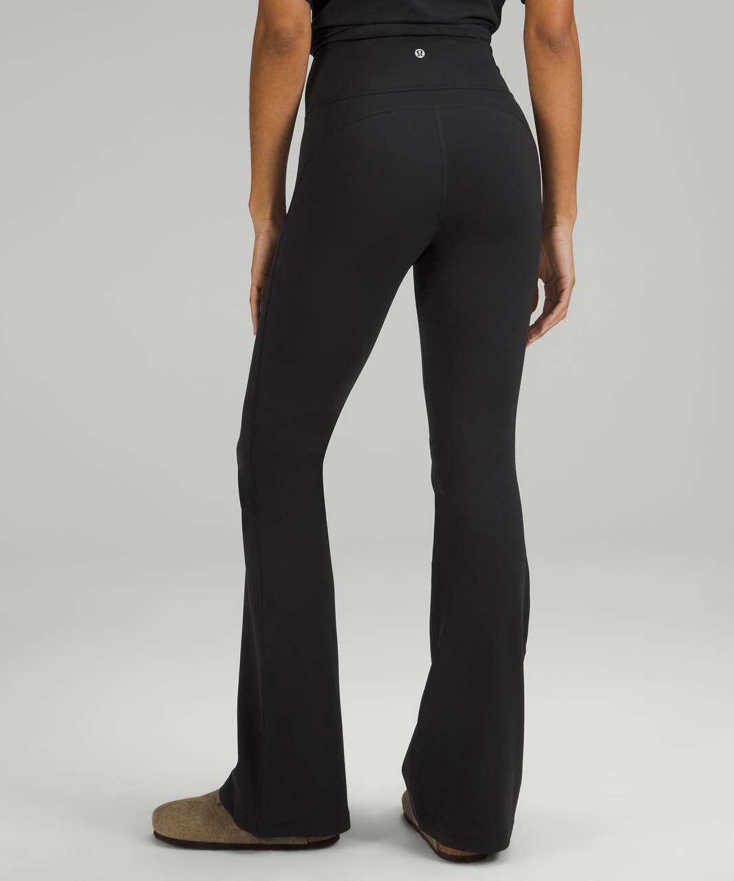 https://storage.googleapis.com/lulu-fanatics/product/78754/1280/lululemon-groove-super-high-rise-flared-pant-nulu-black-0001-418805.jpg