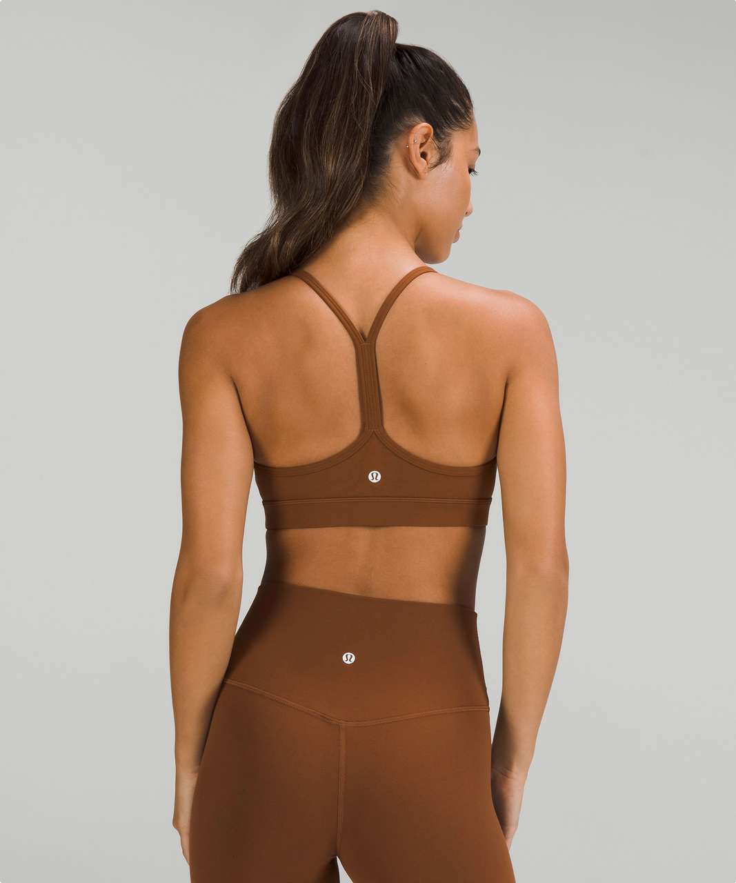 https://storage.googleapis.com/lulu-fanatics/product/78776/1280/lululemon-flow-y-nulu-bra-light-support-a-c-cups-roasted-brown-055842-418907.jpg