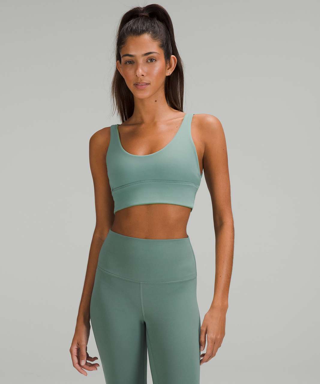 https://storage.googleapis.com/lulu-fanatics/product/78908/1280/lululemon-lululemon-align-reversible-bra-light-support-a-b-cup-tidewater-teal-green-foliage-057627-419570.jpg