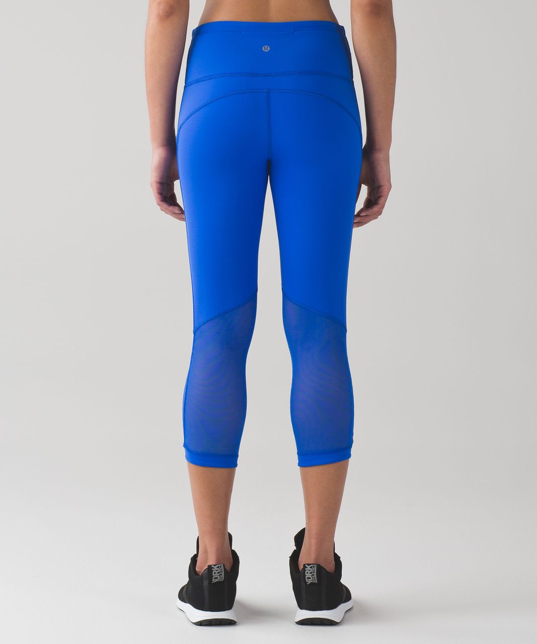 https://storage.googleapis.com/lulu-fanatics/product/7894/1280/lululemon-hit-it-21-crop-cerulean-blue-027754-35791.jpg