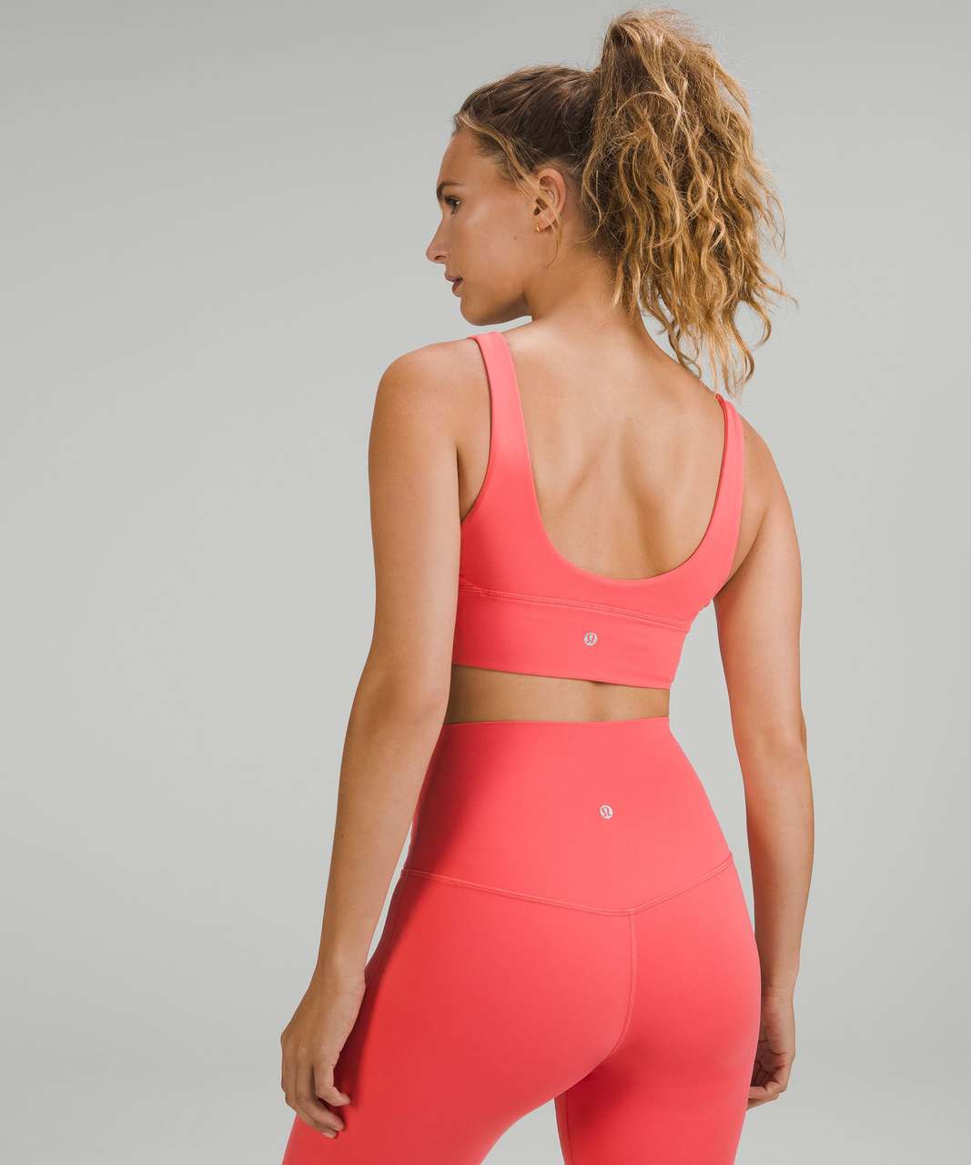 https://storage.googleapis.com/lulu-fanatics/product/79193/1280/lululemon-lululemon-align-reversible-bra-light-support-a-b-cup-pale-raspberry-pale-raspberry-057574-421013.jpg