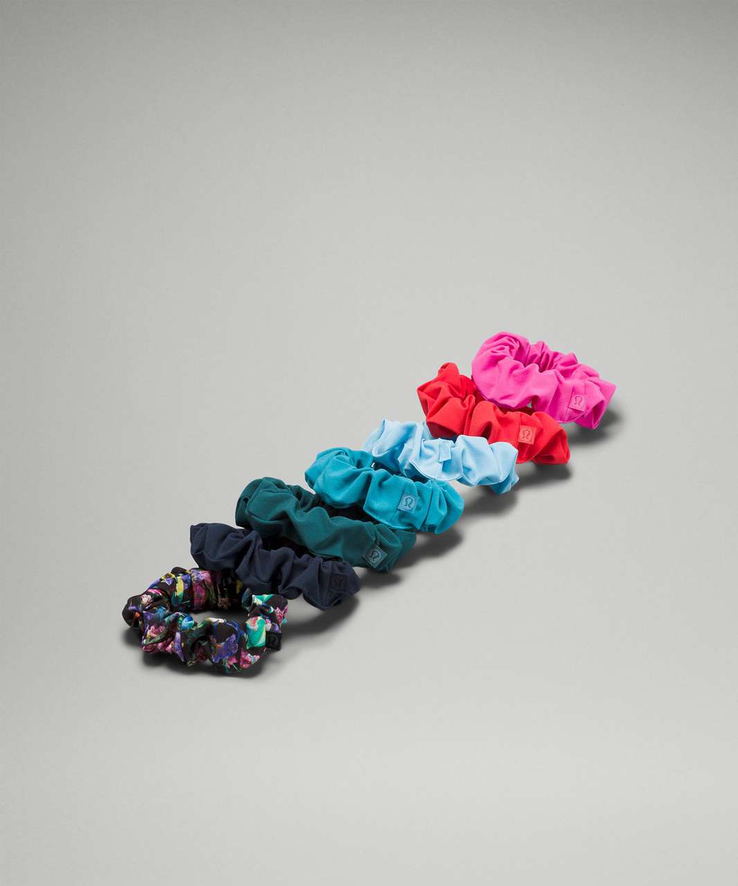 Lululemon Uplifting Scrunchie 7 Pack - True Navy / Oceanic / Green Jasper / Blue Chill / Sonic Pink / Carnation Red / Flowerscope Black Multi