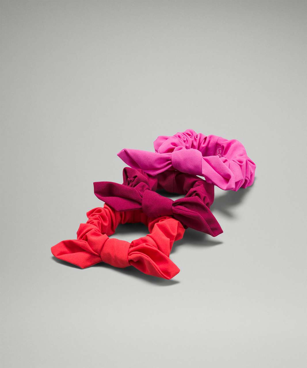 Lululemon Uplifting Bow Scrunchie 3 Pack - Pomegranate / Sonic Pink / Carnation Red