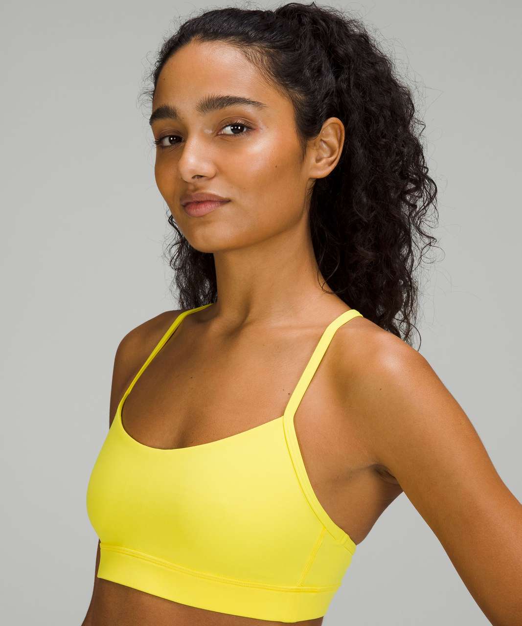 Buy Nike Lemon Yellow Trophy Light Support Sports Bra from Next Luxembourg