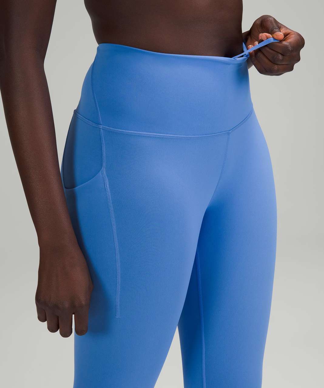 Lululemon Wunder Train High-Rise Tight with Pockets 25 - Blue Nile - lulu  fanatics