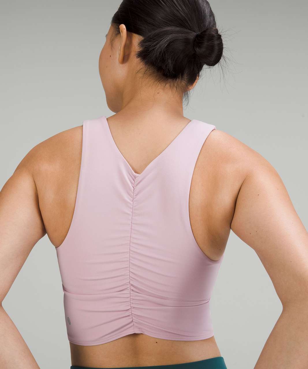 Ribbed Nulu Asymmetrical Yoga Bra in store! Peony Pink (4). I don