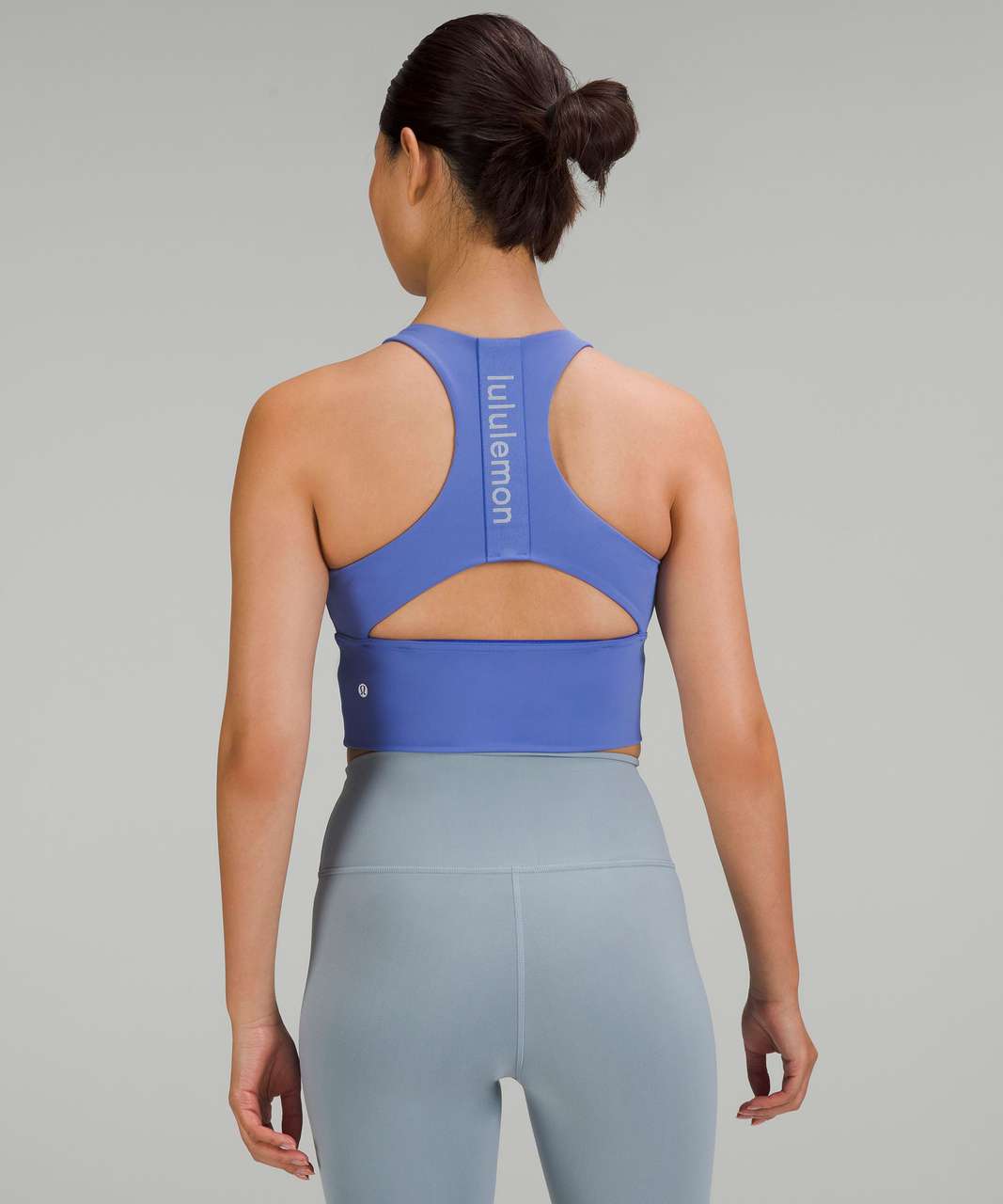 https://storage.googleapis.com/lulu-fanatics/product/80904/1280/lululemon-logo-elastic-everlux-shelf-tank-top-wild-indigo-powder-blue-059346-429759.jpg