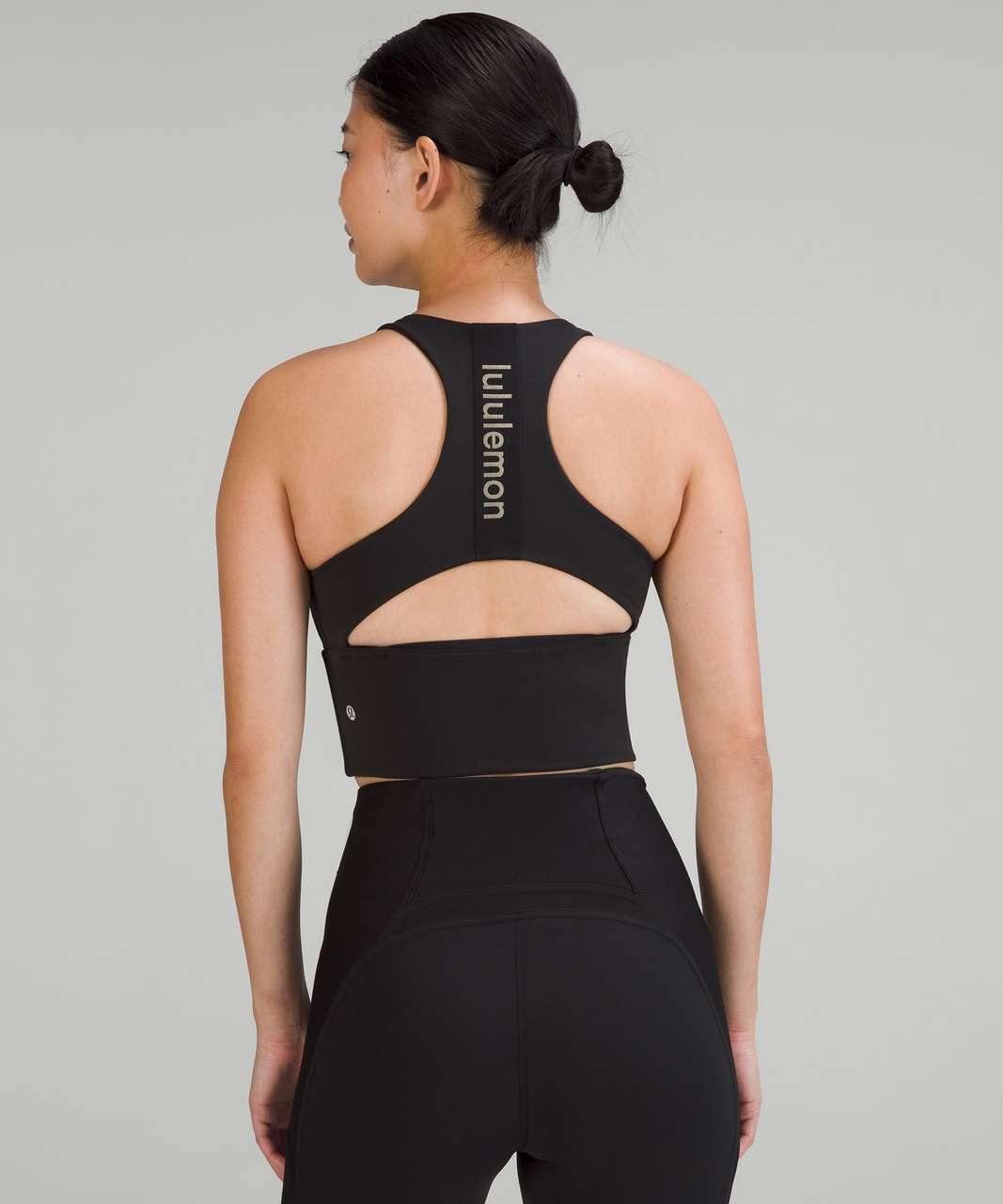 https://storage.googleapis.com/lulu-fanatics/product/80905/1280/lululemon-logo-elastic-everlux-shelf-tank-top-black-trench-050984-429764.jpg