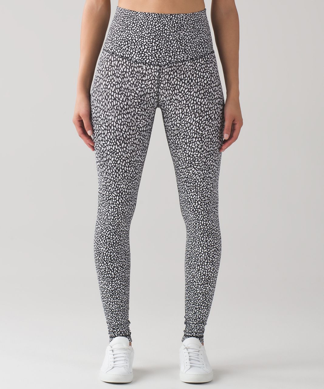 black lululemon leggings with white dots