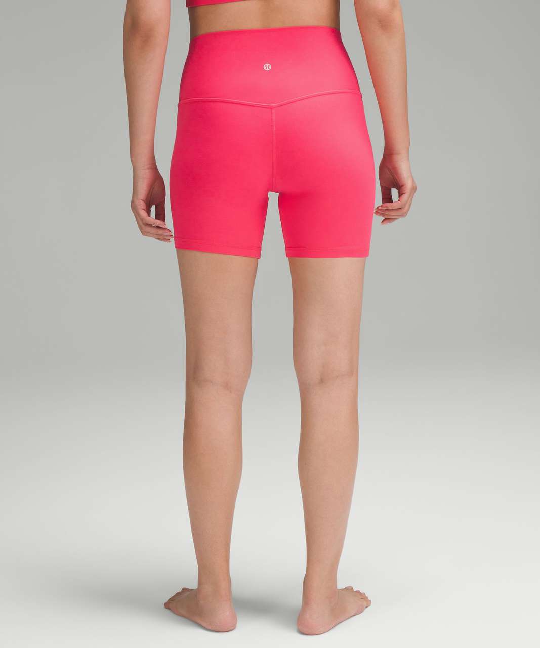 The brighter the better. Lip gloss Align 6” shorts and high-neck