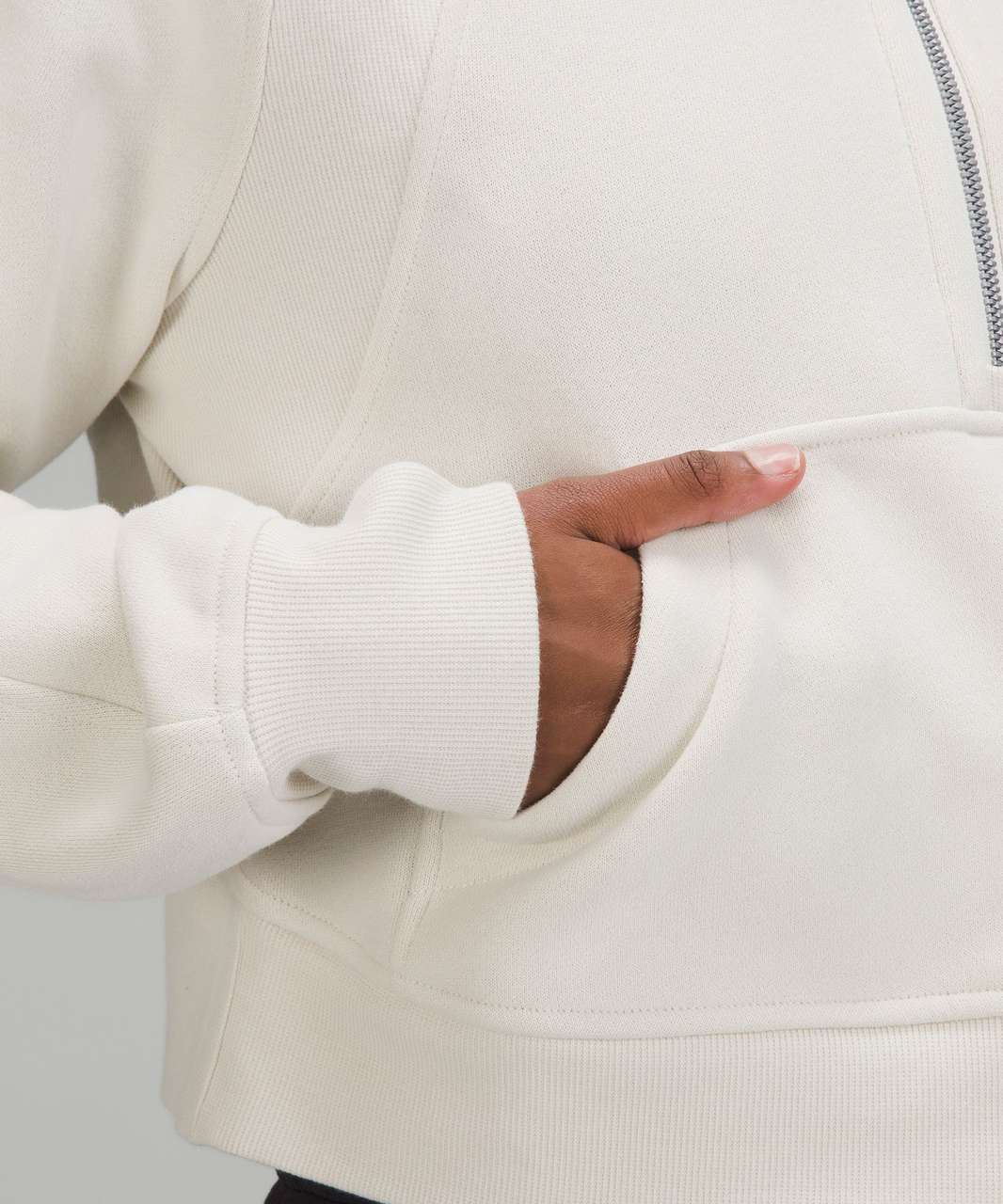 Thoughts on the Scuba half-zip in Bone? I bought the Scuba funnel-neck in  White Opal around a year ago, but the color seems darker/more yellow than  some other White Opal items I