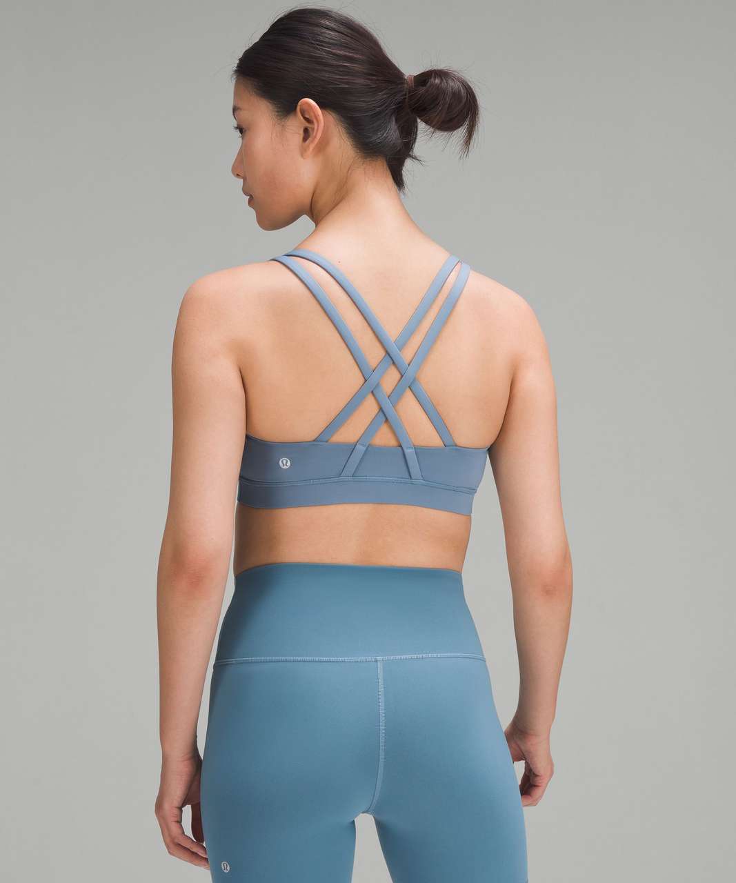 https://storage.googleapis.com/lulu-fanatics/product/81323/1280/lululemon-lululemon-energy-bra-medium-support-b-d-cups-utility-blue-036744-431888.jpg