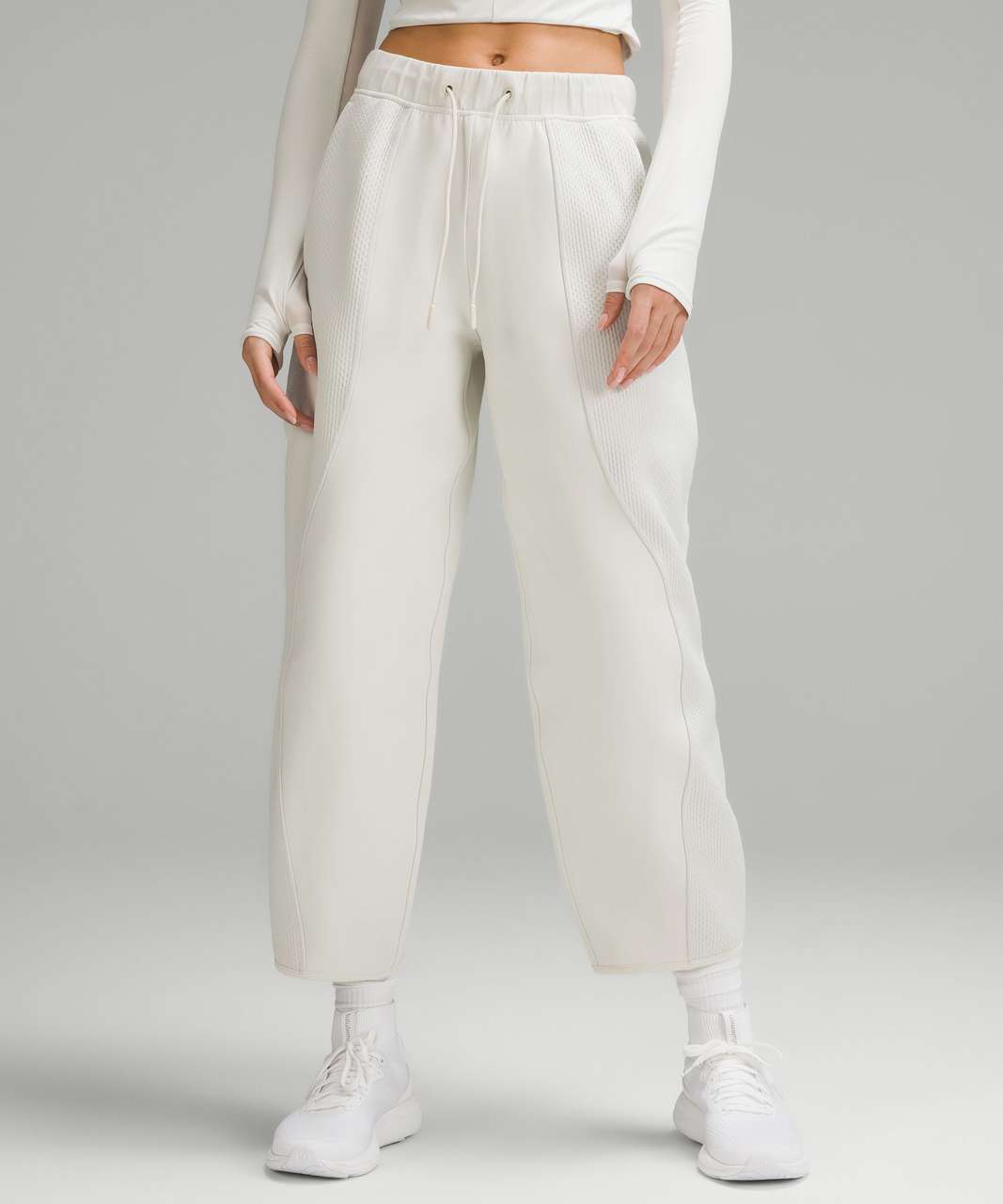 https://storage.googleapis.com/lulu-fanatics/product/82507/1280/lululemon-mixed-fabric-relaxed-fit-tapered-high-rise-pant-bone-027597-438247.jpg